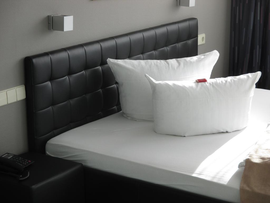 Businesshotel & Appartements Stuttgart-Vaihingen Pokoj fotografie